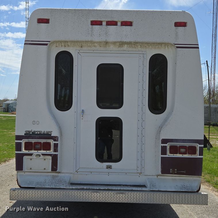 image for item EN3617 1994 Ford E350 shuttle bus