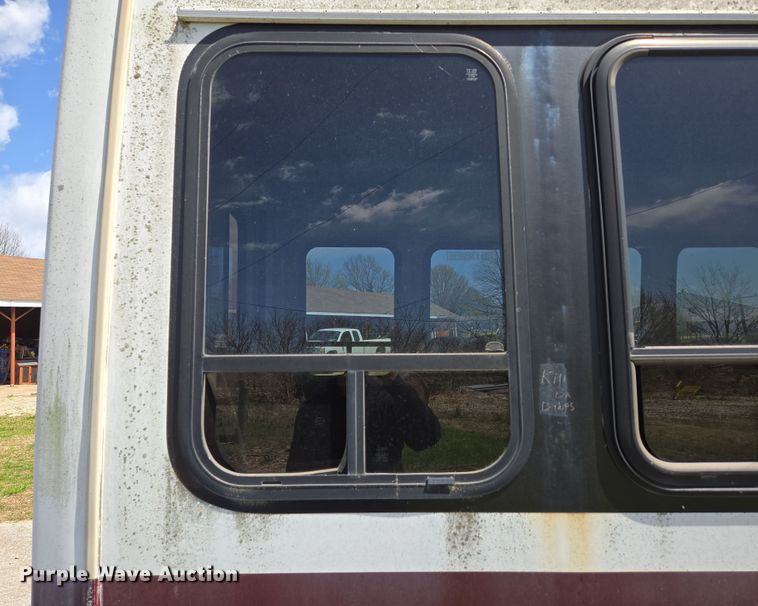 image for item EN3617 1994 Ford E350 shuttle bus