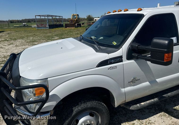 image for item DP6294 2015 Ford F350 Super Duty SuperCrew utility bed pickup truck