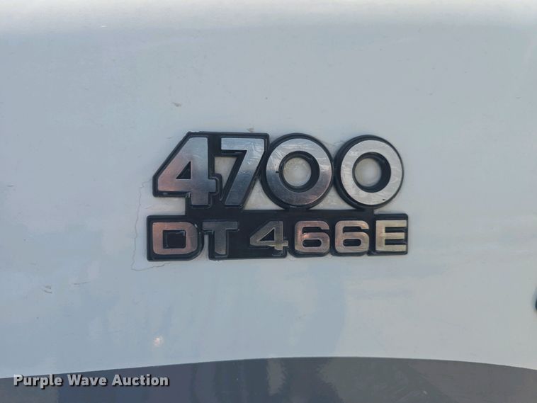 image for item DO7902 2000 International 4700 flatbed truck