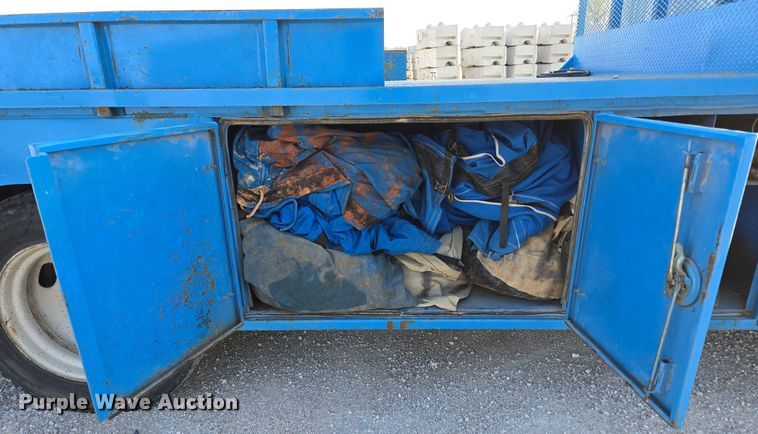 image for item DP6324 2000 International 4700 flatbed truck