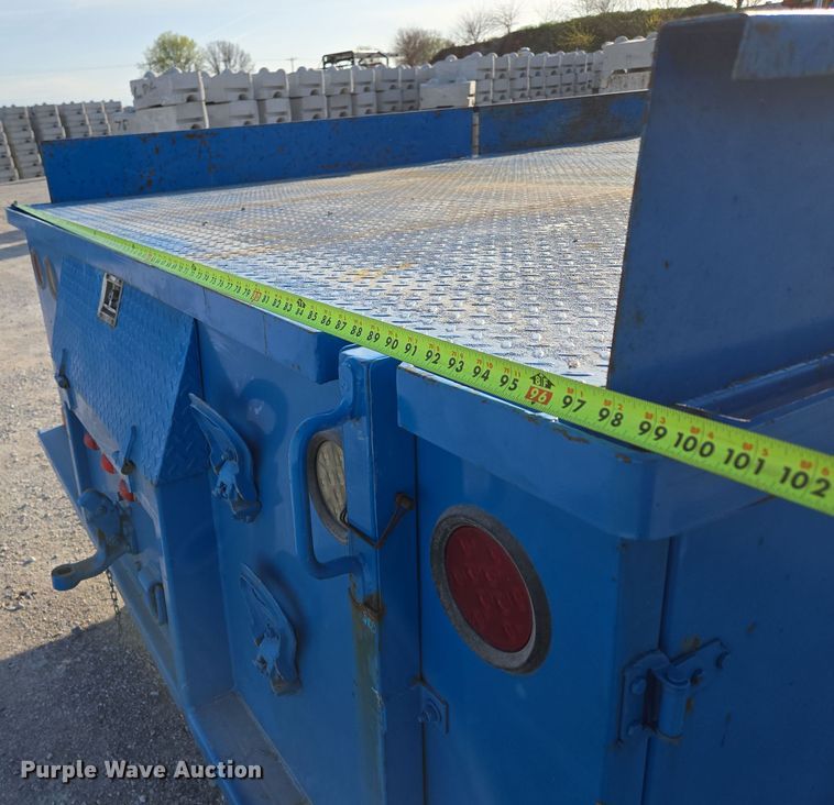 image for item DP6324 2000 International 4700 flatbed truck