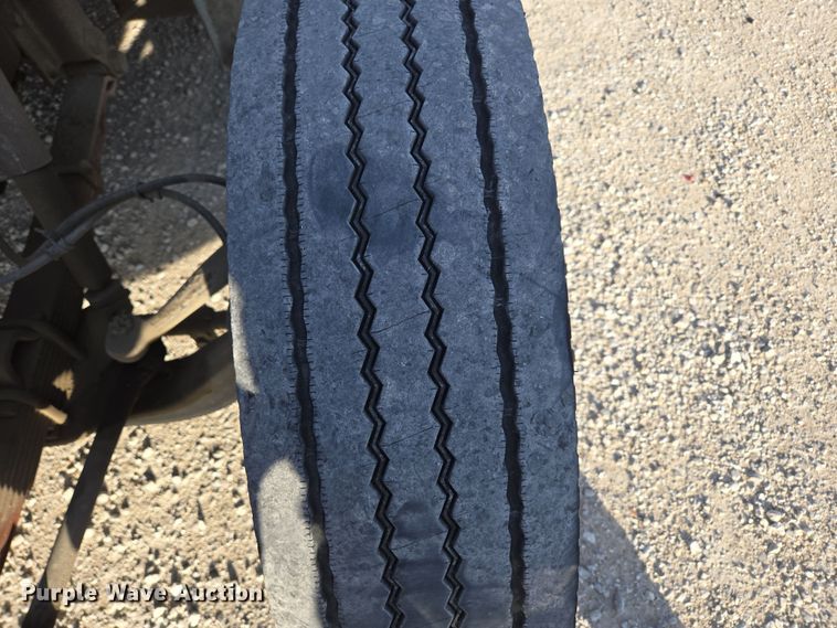 image for item DP6324 2000 International 4700 flatbed truck