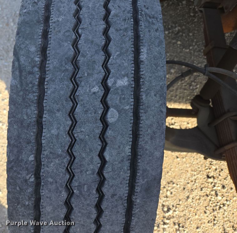 image for item DP6324 2000 International 4700 flatbed truck