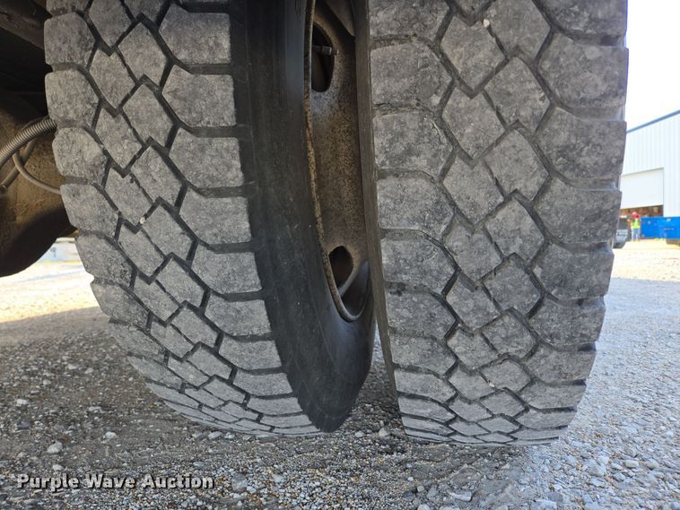 image for item DP6324 2000 International 4700 flatbed truck