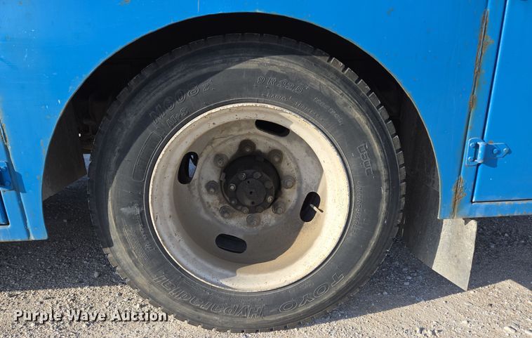 image for item DP6324 2000 International 4700 flatbed truck