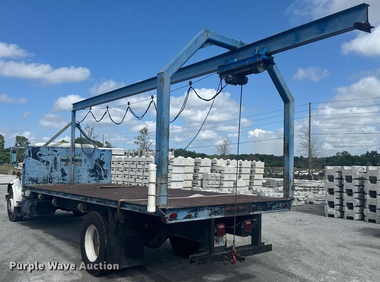 image for item EC3525 1999 International 4700 flatbed truck