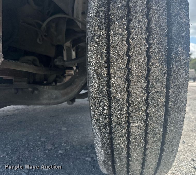 image for item EC3525 1999 International 4700 flatbed truck