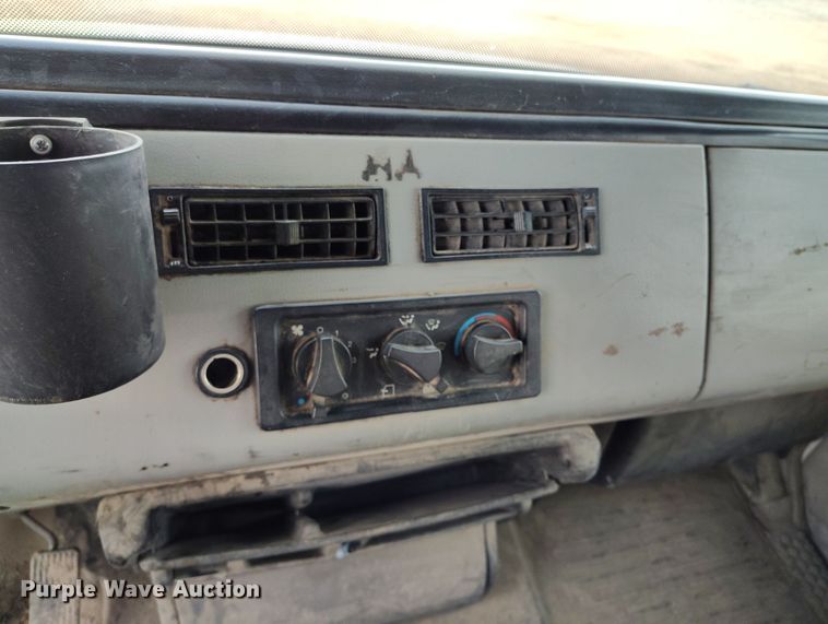 image for item EH0233 2000 Freightliner FL80 roll-off container truck