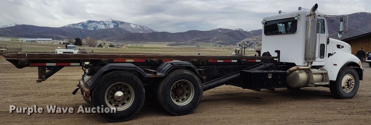 image for item EH0234 2005 Peterbilt 335  roll-off container truck