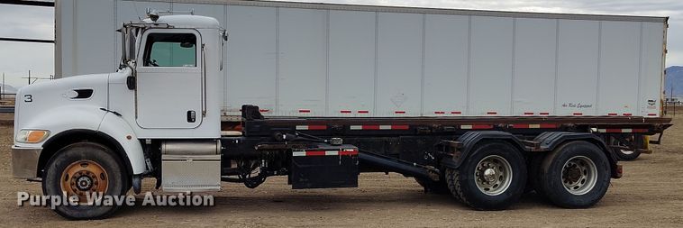 image for item EH0234 2005 Peterbilt 335  roll-off container truck