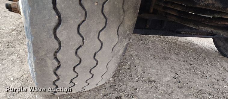 image for item EH0234 2005 Peterbilt 335  roll-off container truck