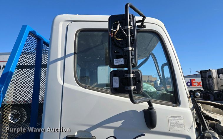 image for item EM7034 2017 Hino   268 flatbed truck