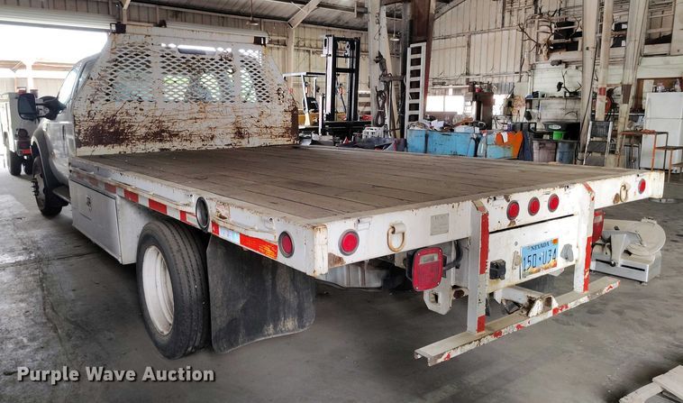 image for item IP9559 2005 Ford F550 Super Duty Crew Cab flatbed truck