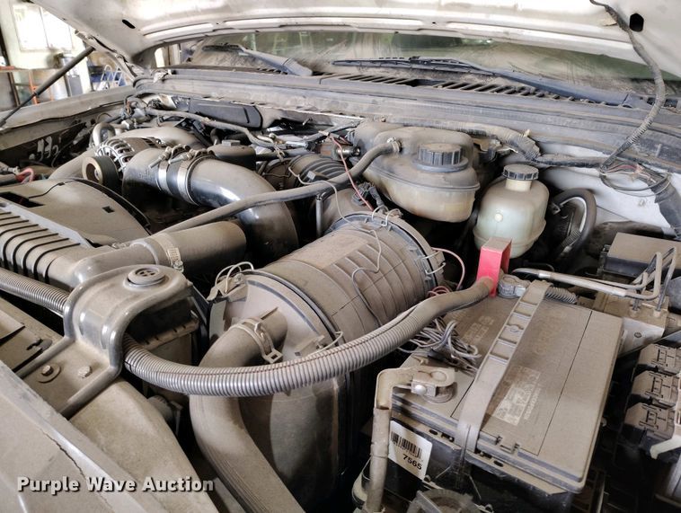 image for item IP9559 2005 Ford F550 Super Duty Crew Cab flatbed truck