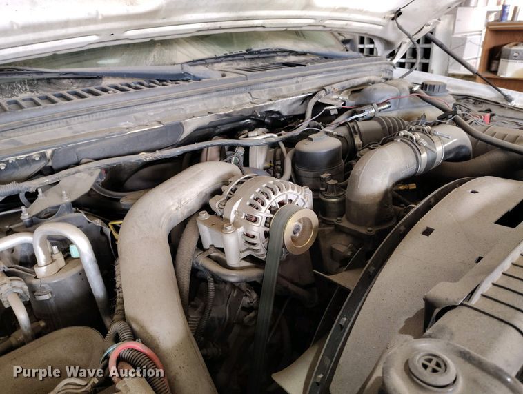 image for item IP9559 2005 Ford F550 Super Duty Crew Cab flatbed truck