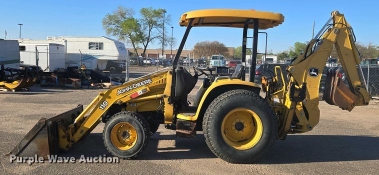 image for item EO0730 John Deere 110 backhoe