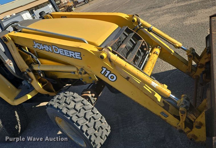 image for item EO0730 John Deere 110 backhoe