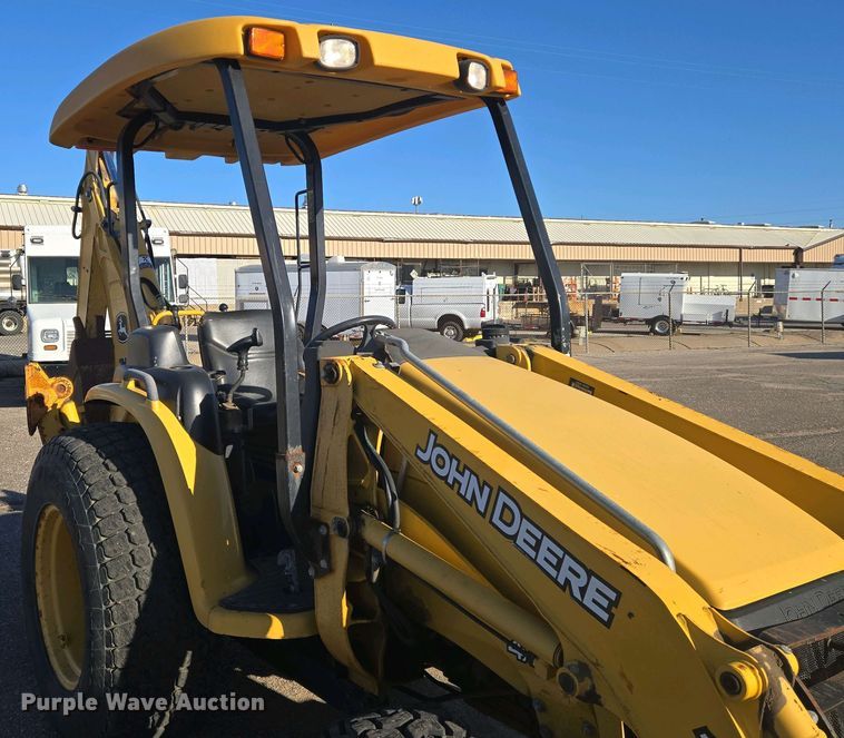 image for item EO0730 John Deere 110 backhoe