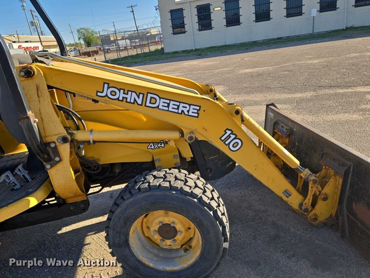 image for item EO0730 John Deere 110 backhoe