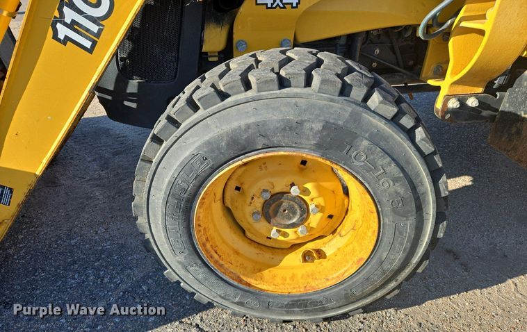 image for item EO0730 John Deere 110 backhoe