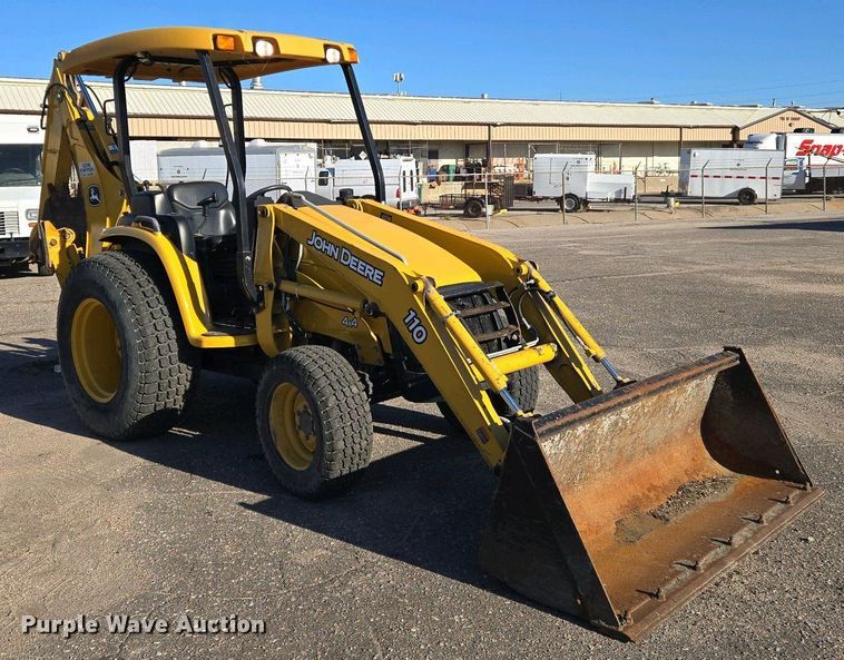 image for item EO0731 John Deere 110S backhoe
