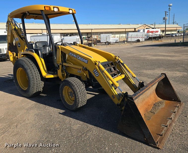 image for item EO0731 John Deere 110S backhoe
