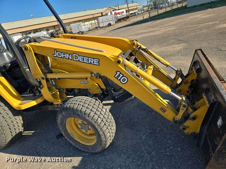 image for item EO0731 John Deere 110S backhoe