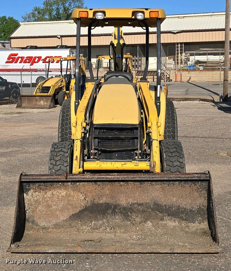 image for item EO0732 John Deere 110S backhoe