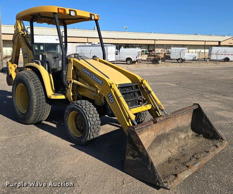 image for item EO0732 John Deere 110S backhoe