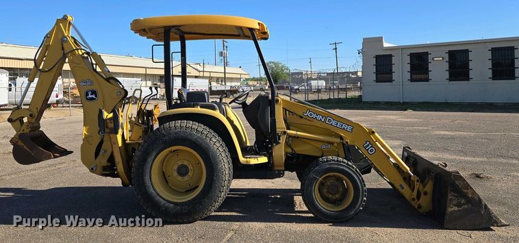 image for item EO0732 John Deere 110S backhoe