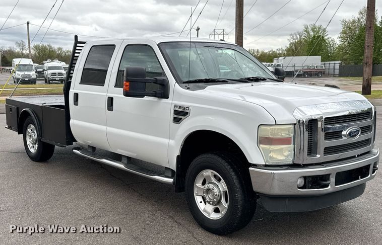 image for item DO0747 2010 Ford F350 Super Duty Crew Cab flatbed pickup truck