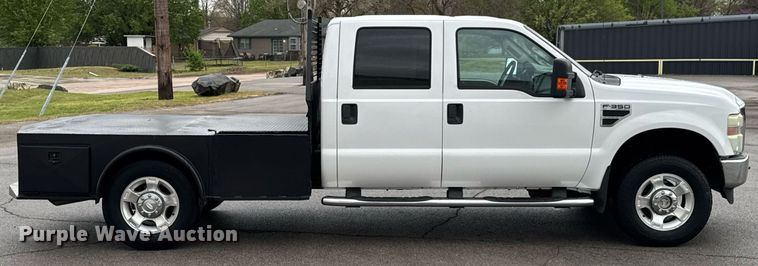 image for item DO0747 2010 Ford F350 Super Duty Crew Cab flatbed pickup truck