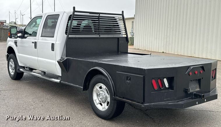 image for item DO0747 2010 Ford F350 Super Duty Crew Cab flatbed pickup truck
