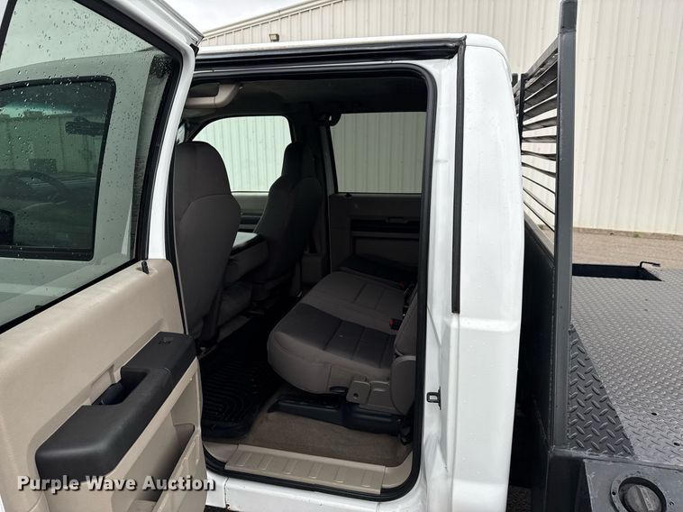 image for item DO0747 2010 Ford F350 Super Duty Crew Cab flatbed pickup truck
