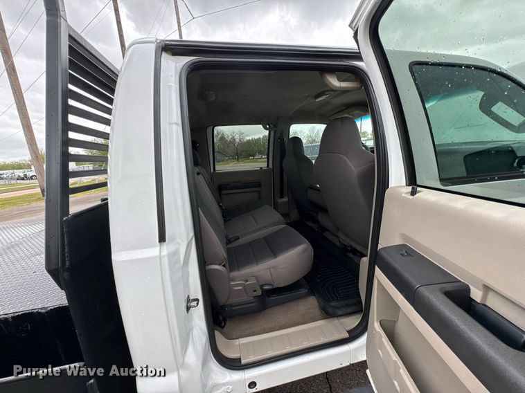 image for item DO0747 2010 Ford F350 Super Duty Crew Cab flatbed pickup truck