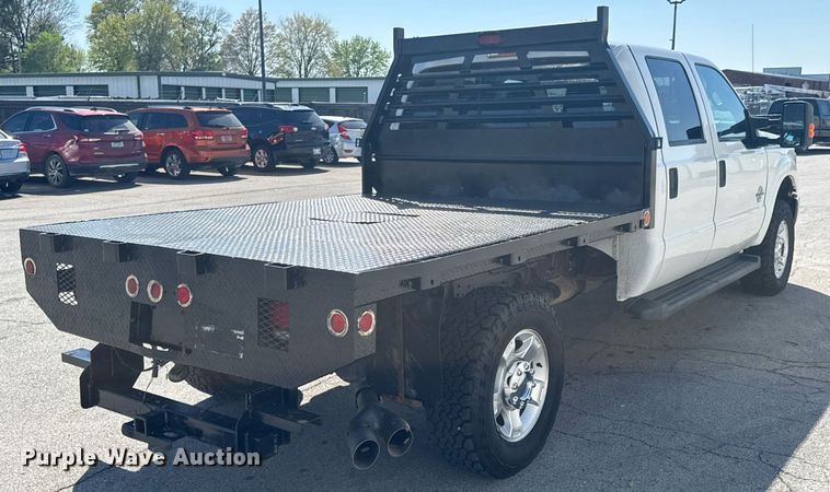 image for item DO0868 2012 Ford F250 Super Duty Crew Cab flatbed pickup truck