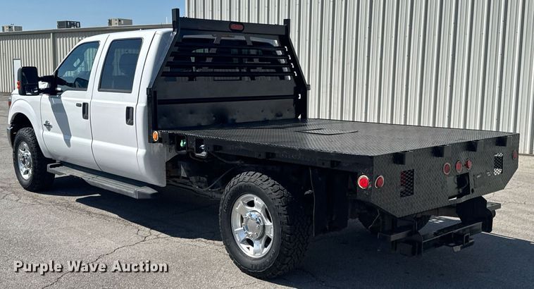 image for item DO0868 2012 Ford F250 Super Duty Crew Cab flatbed pickup truck