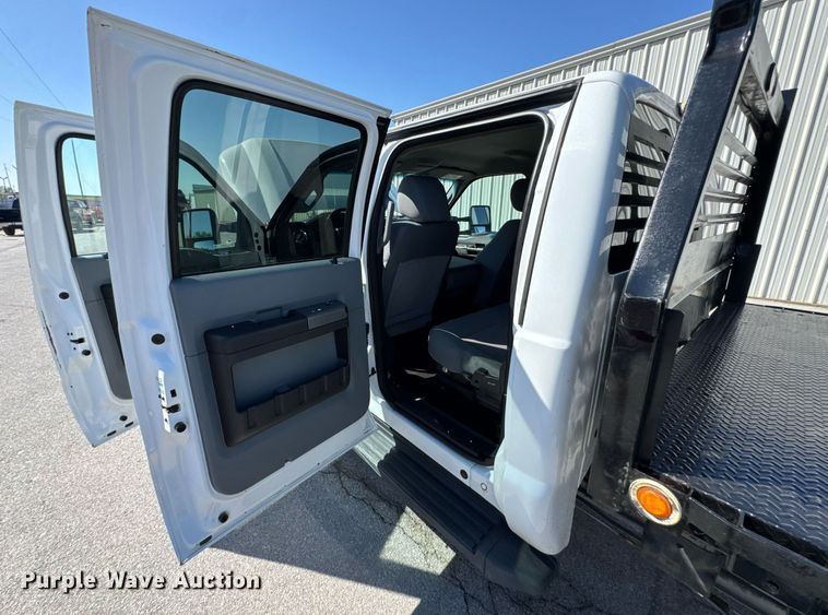 image for item DO0868 2012 Ford F250 Super Duty Crew Cab flatbed pickup truck