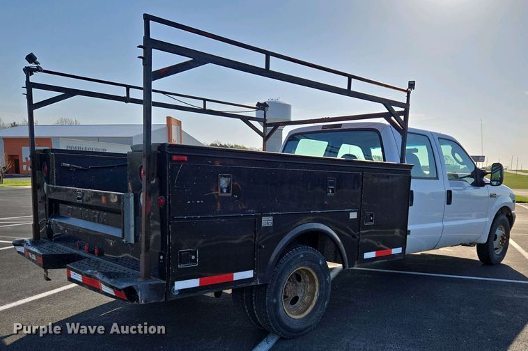 image for item DP6338 2004 Ford F350 Super Duty XL Crew Cab utility bed pickup truck