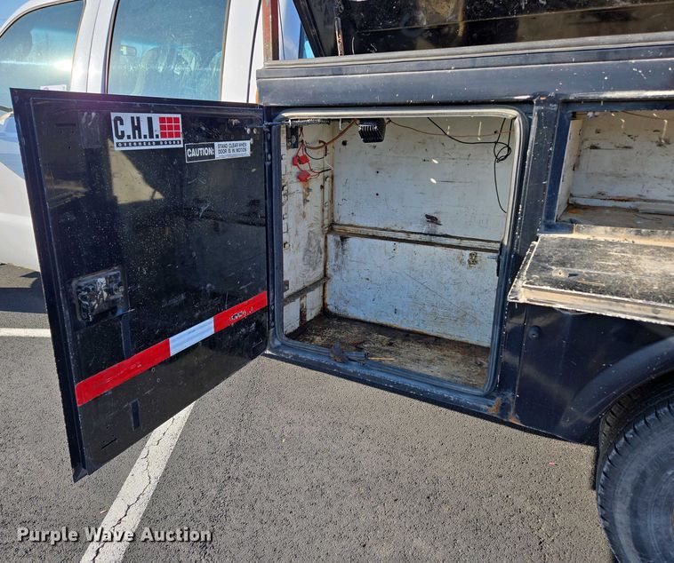 image for item DP6338 2004 Ford F350 Super Duty XL Crew Cab utility bed pickup truck