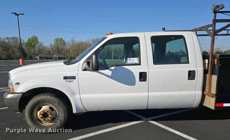 image for item DP6338 2004 Ford F350 Super Duty XL Crew Cab utility bed pickup truck