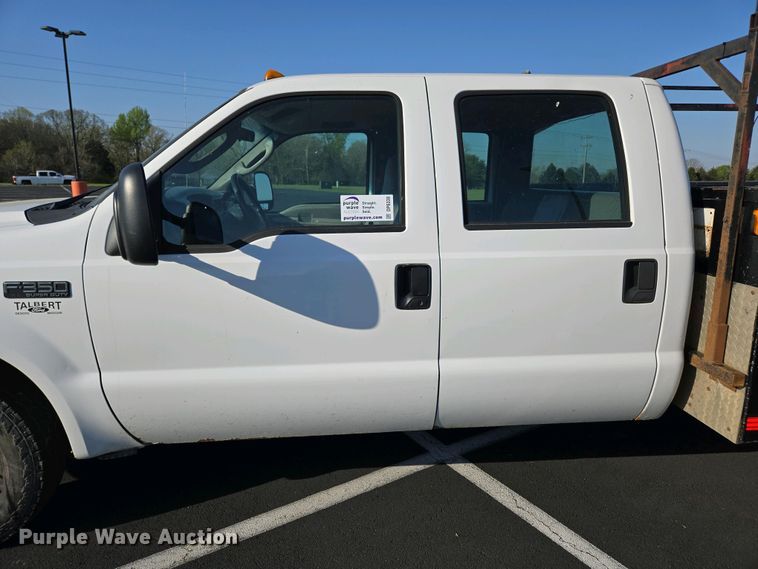 image for item DP6338 2004 Ford F350 Super Duty XL Crew Cab utility bed pickup truck