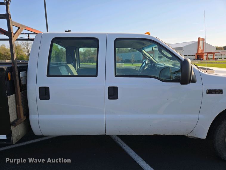 image for item DP6338 2004 Ford F350 Super Duty XL Crew Cab utility bed pickup truck