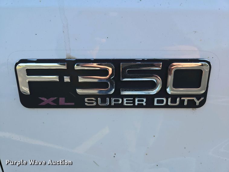 image for item DP6338 2004 Ford F350 Super Duty XL Crew Cab utility bed pickup truck