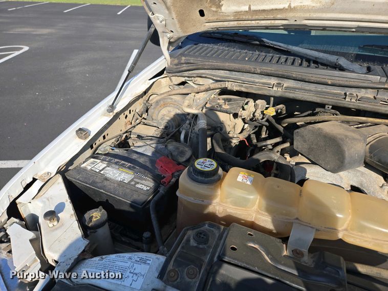 image for item DP6338 2004 Ford F350 Super Duty XL Crew Cab utility bed pickup truck