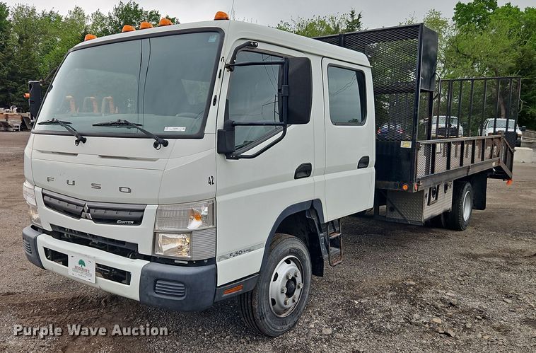 image for item EI8998 2019 Mitsubishi Fuso FE160 Crew Cab flatbed truck