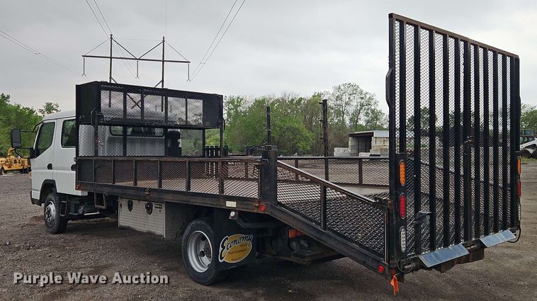 image for item EI8998 2019 Mitsubishi Fuso FE160 Crew Cab flatbed truck