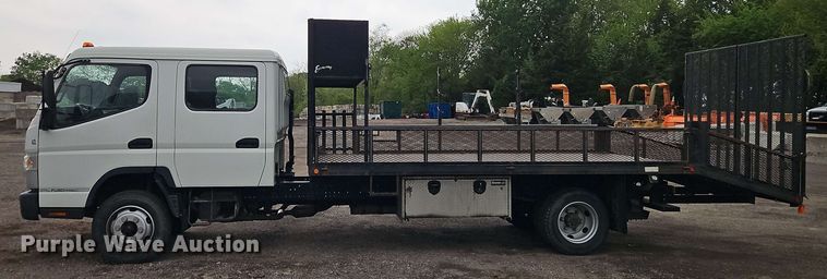 image for item EI8998 2019 Mitsubishi Fuso FE160 Crew Cab flatbed truck