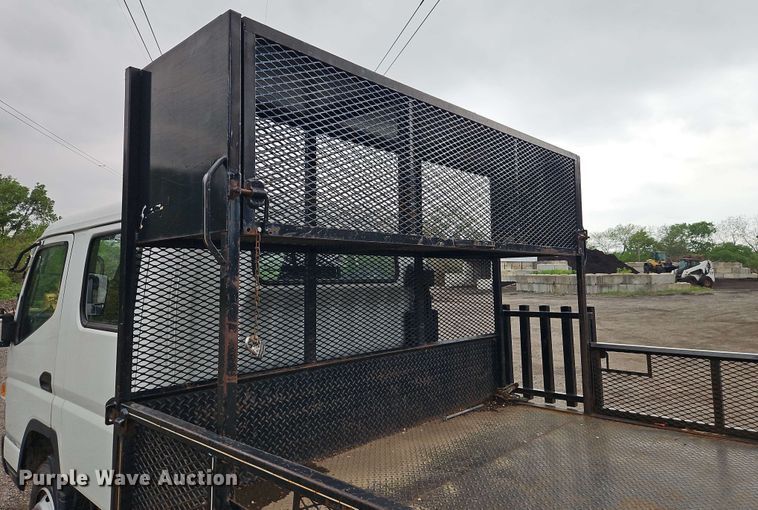 image for item EI8998 2019 Mitsubishi Fuso FE160 Crew Cab flatbed truck